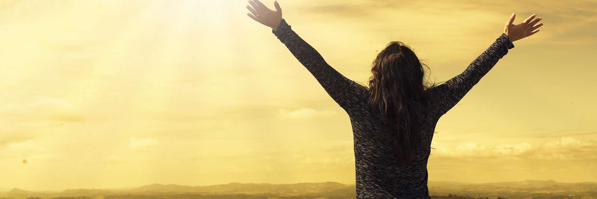 Young woman praises God